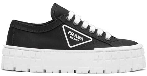 prada black platform sneakers.